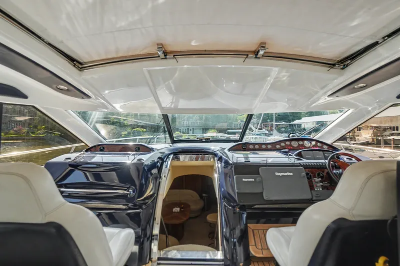 Slide: The Image of Interior view of 2001 Viking Sport Cruisers V65 yacht cockpit with modern navigation equipment. - 44