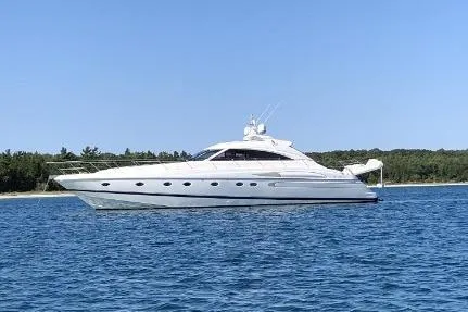 Slide: The Image of 2002 Viking Sport Cruisers V65 yacht on calm blue water, clear sky background. - 23