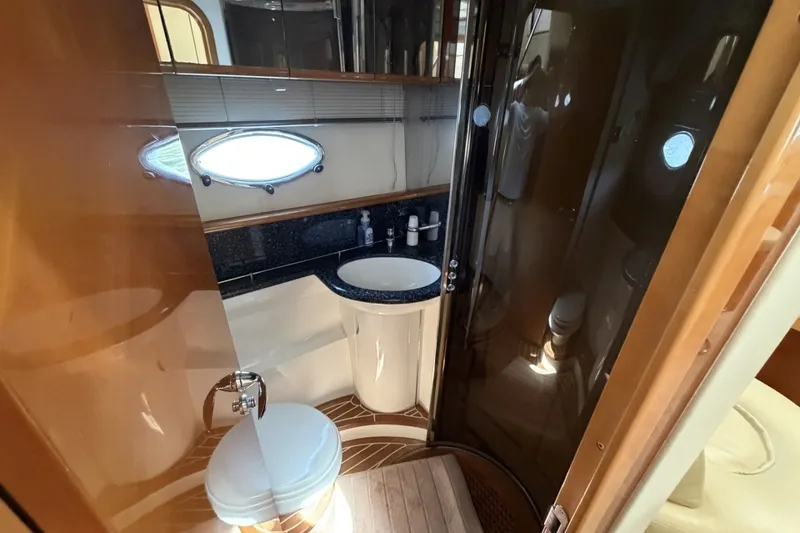 Slide: The Image of Luxurious bathroom in 2001 Viking Sport Cruisers V65 yacht with modern fixtures. - 61