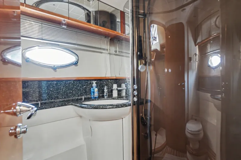 Slide: The Image of Luxurious bathroom interior of 2001 Viking Sport Cruisers V65 yacht with modern fixtures. - 37