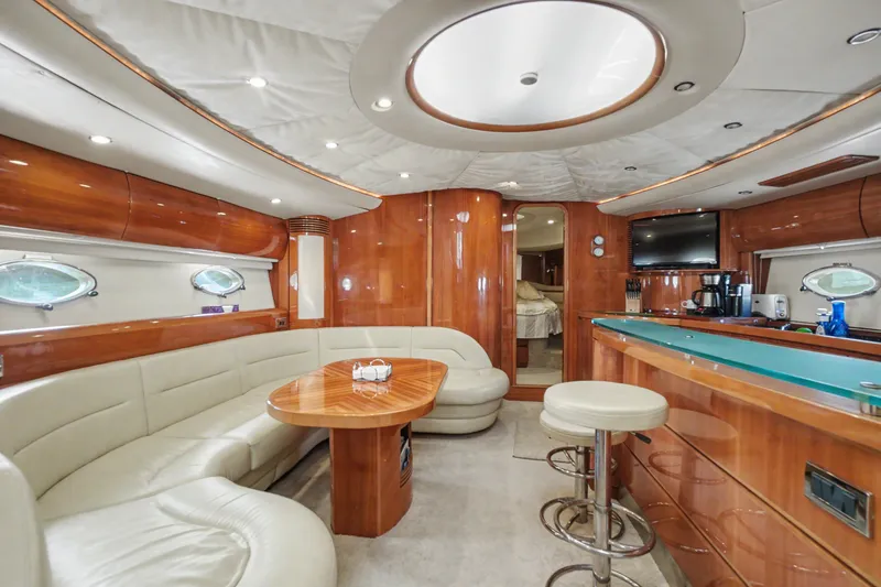 Slide: The Image of Luxurious interior of 2001 Viking Sport Cruisers V65 yacht with elegant seating and modern amenities. - 35