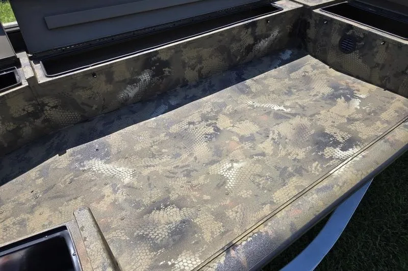 Slide: The Image of Interior of 2026 Havoc 1756 DBST boat with camouflage pattern flooring. - 13