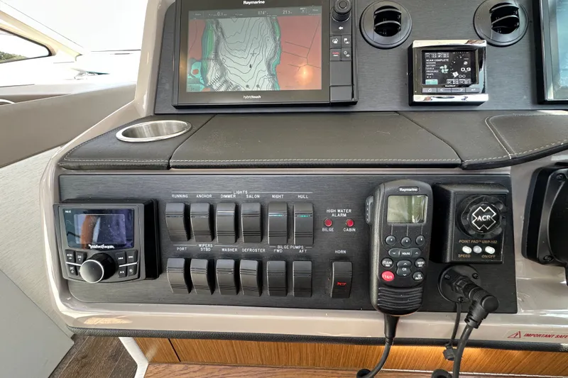 Slide: The Image of Control panel of a 2017 Sea Ray Sundancer 460 yacht with navigation equipment. - 22
