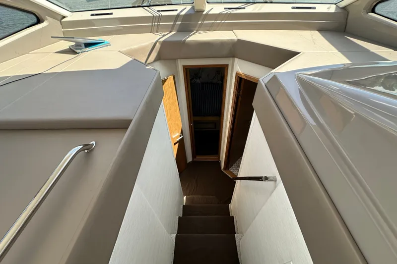 Slide: The Image of Interior view of 2017 Sea Ray Sundancer 460 yacht, showing stairs and cabin entrance. - 25