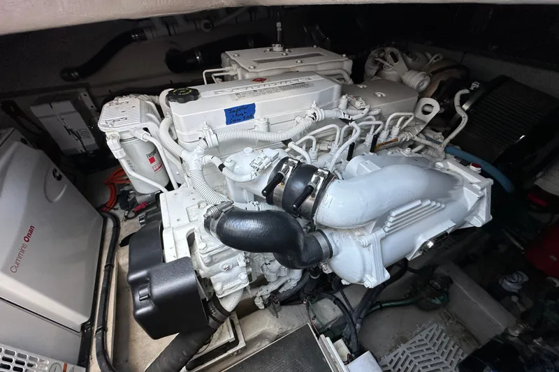 Slide: The Image of Engine room of a 2017 Sea Ray Sundancer 460 with Cummins Onan generator. - 39