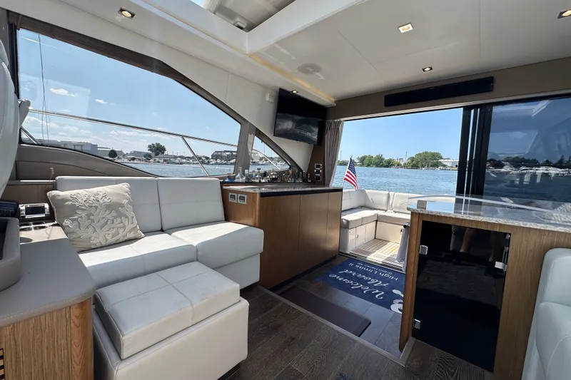 Slide: The Image of Luxurious interior of 2017 Sea Ray Sundancer 460 yacht with waterfront view. - 15