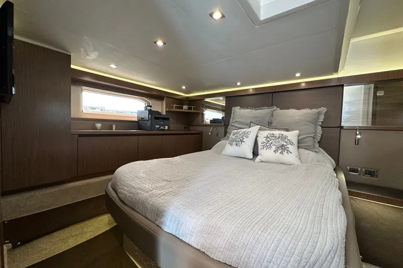 Slide: The Image of Luxurious interior of 2017 Sea Ray Sundancer 460 yacht with cozy bed and modern decor. - 28