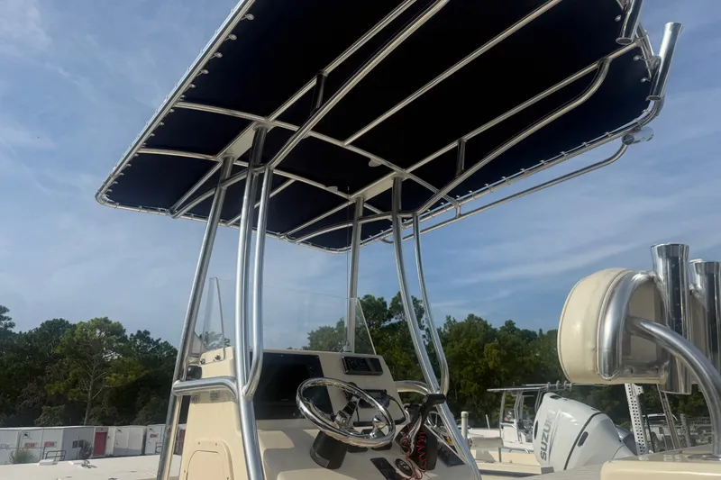 Slide: The Image of 2015 Jones Brothers Bateau 23 boat with T-top and steering console. - 6