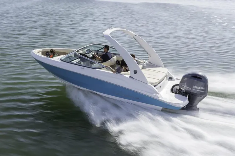 The Image of Manufacturer Provided Image: 2026 Regal 21 OBX speedboat cruising on water with Yamaha outboard engine. - 0
