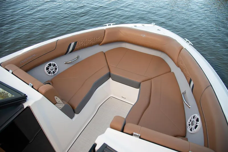 Slide: The Image of Manufacturer Provided Image: Luxurious seating on 2026 Regal LS2 Surf boat, featuring tan upholstery and sleek design. - 6