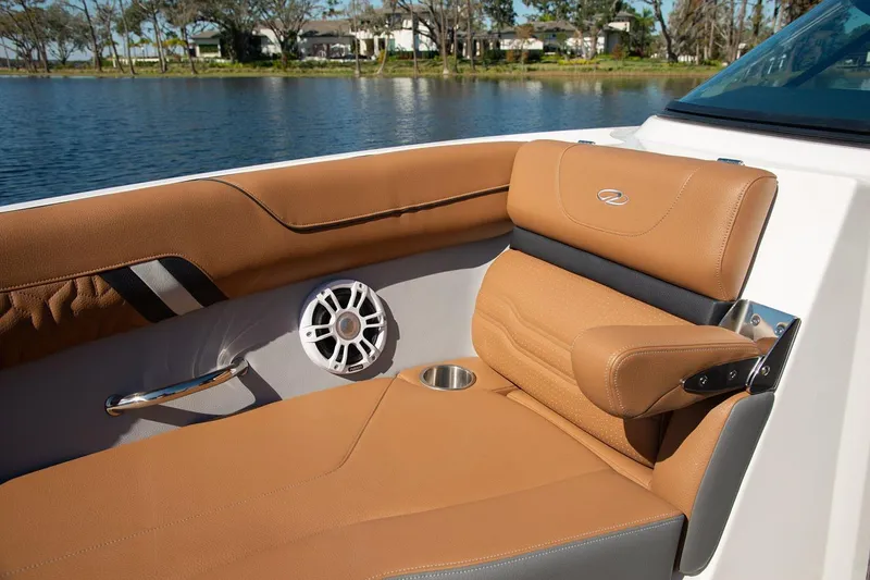 Slide: The Image of Manufacturer Provided Image: Luxurious seating on 2026 Regal LS2 Surf boat, featuring tan upholstery and sleek design. - 7