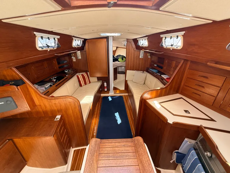 Slide: The Image of Interior of a 1992 Tartan T 31 with wood finish and beige upholstery. - 10
