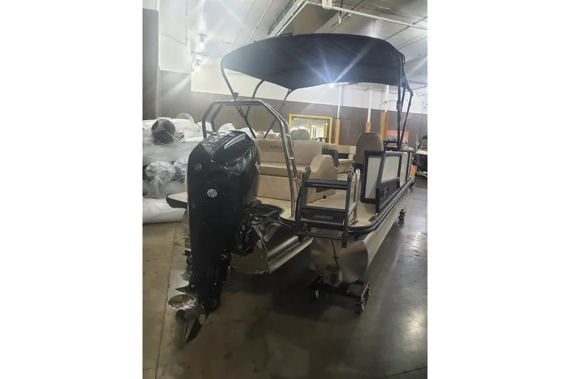 Slide: The Image of 2027 Alera A22L pontoon boat with outboard motor in a showroom. - 20