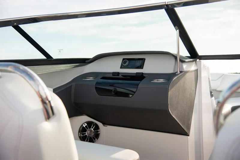 Slide: The Image of Manufacturer Provided Image: Interior view of 2026 Regal LS4 Surf boat dashboard with modern controls and sleek design. - 9