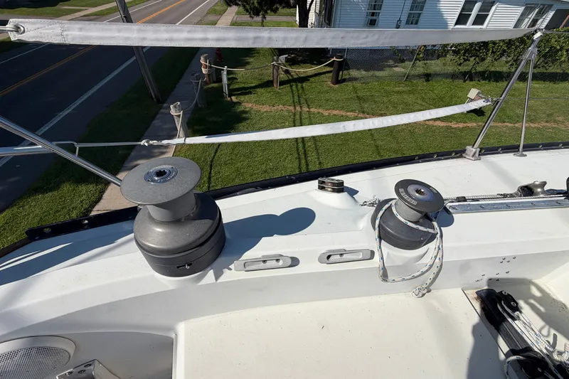 Slide: The Image of Deck view of a 1984 C&C 33 MK II sailboat with winches and rigging. - 11
