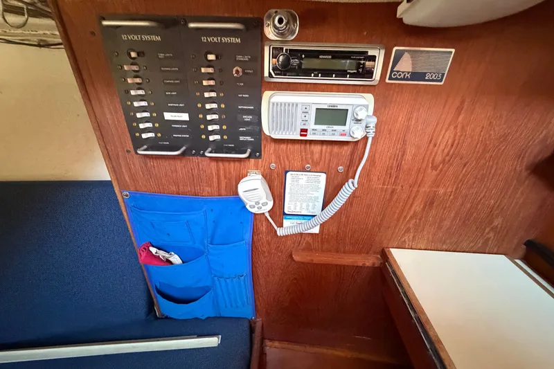 Slide: The Image of Interior of 1984 C&C 33 MK II sailboat with control panel and communication equipment. - 38
