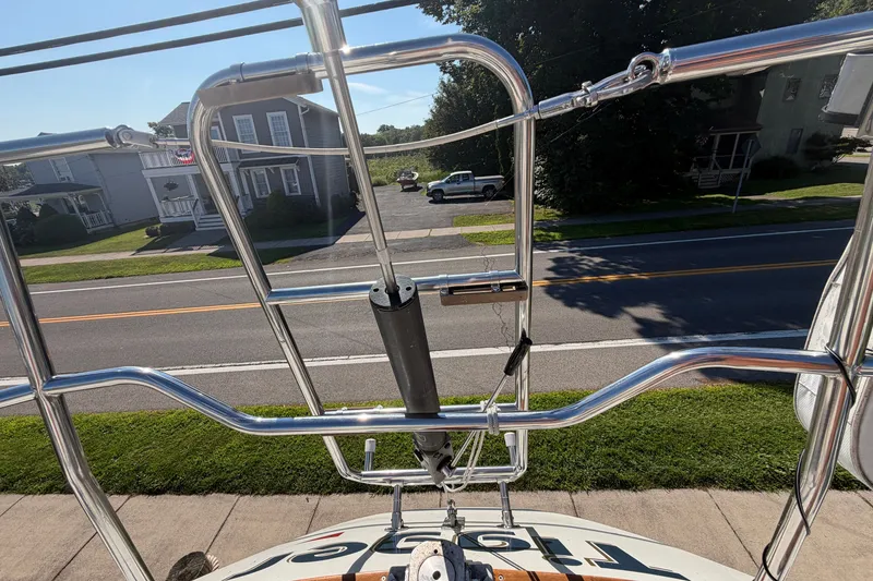 Slide: The Image of 1984 C&C 33 MK II sailboat stern view with polished metal railings. - 9