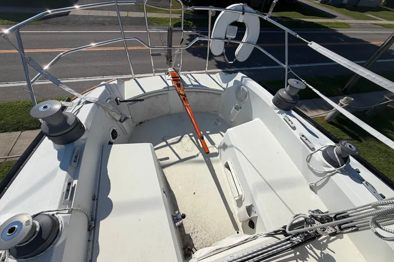 Slide: The Image of 1984 C&C 33 MK II sailboat cockpit with winches and safety equipment. - 5