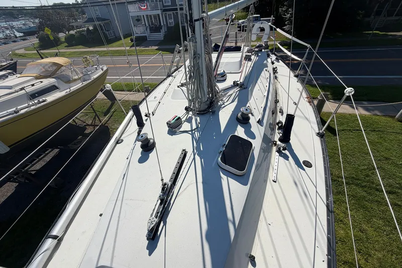 Slide: The Image of 1984 C&C 33 MK II sailboat deck view, showcasing rigging and winches. - 26