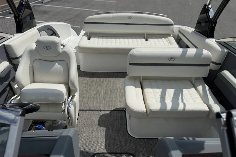 Slide: The Image of Interior of a 2017 Cobalt R3 boat with white leather seating. - 14