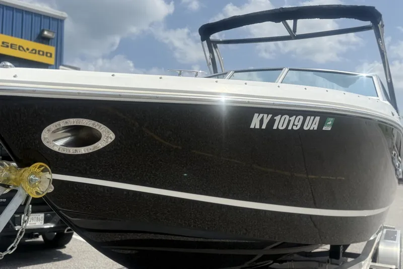 Slide: The Image of 2017 Cobalt R3 boat on trailer, registration KY 1019 UA, sunny day. - 1