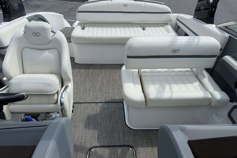 Slide: The Image of 2017 Cobalt R3 boat interior with white leather seating and modern design. - 21