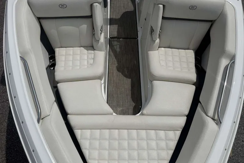 Slide: The Image of Luxurious seating in a 2017 Cobalt R3 boat, featuring elegant white upholstery. - 7