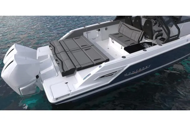 Slide: The Image of Manufacturer Provided Image: 2026 Monterey Elite 34 OB boat with sleek design and spacious seating on water. - 4