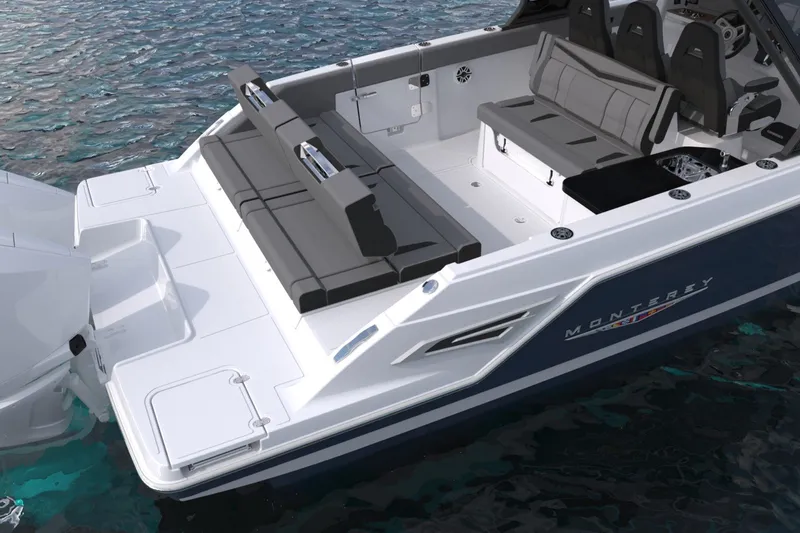 Slide: The Image of 2027 Monterey Elite 34 OB boat with sleek seating and modern design on water. - 8
