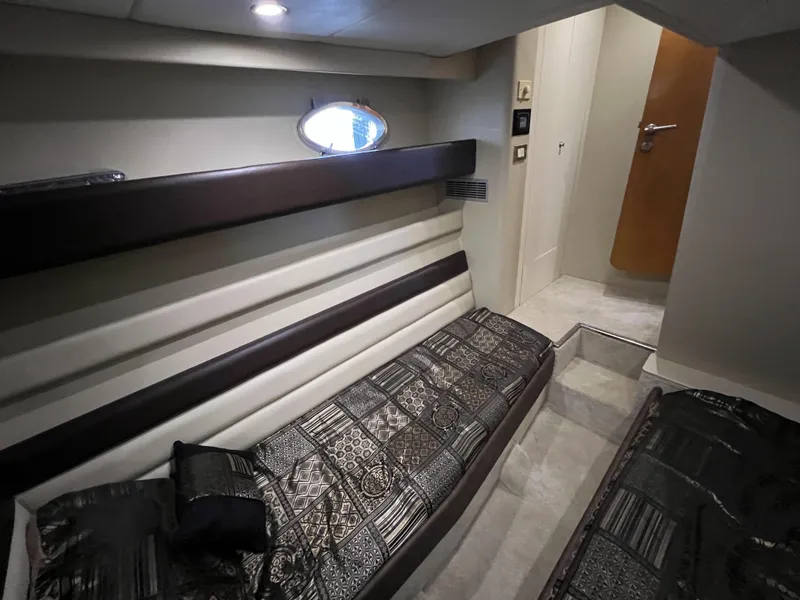 Slide: The Image of Interior cabin of 1994 Sunseeker Camargue 55 yacht with modern decor and bedding. - 14