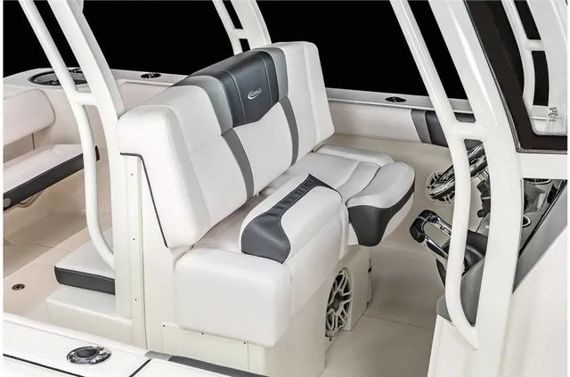 Slide: The Image of The 2021 Robalo R272 Center Console features a sleek, cushioned bench seat with modern accents. - 22