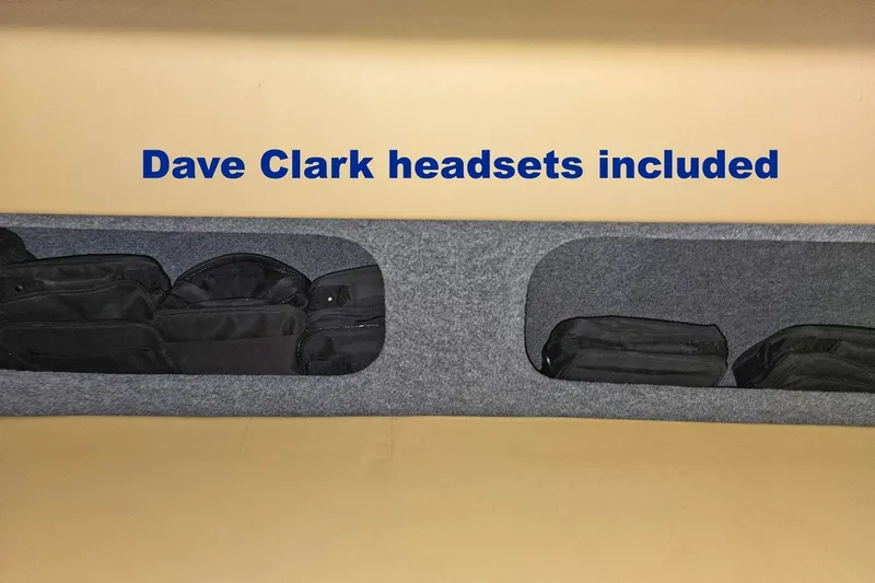 Slide: The Image of Storage compartment with Dave Clark headsets included in 2010 Nor-Tech 4300V boat. - 112