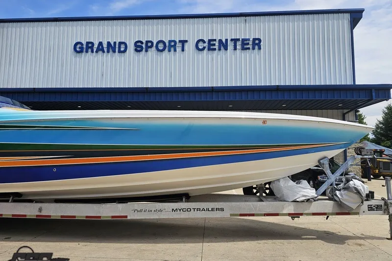 Slide: The Image of 2010 Nor-Tech 4300V boat on trailer at Grand Sport Center. - 17
