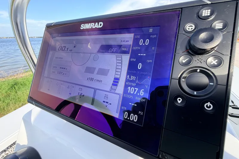 Slide: The Image of Simrad display on 2021 Hell's Bay Marathon boat, showing navigation and performance data. - 56
