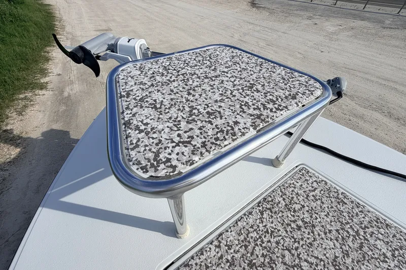 Slide: The Image of 2021 Hell's Bay Marathon boat deck with speckled non-slip surface and trolling motor. - 35