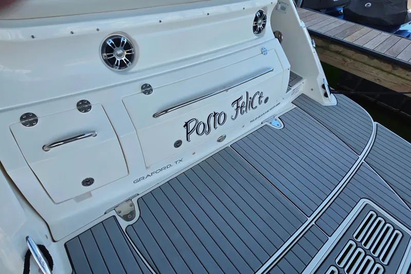 Slide: The Image of 2021 Sea Ray Sundancer 350 boat deck with custom name "Posto Felice," docked in Graford, TX. - 14