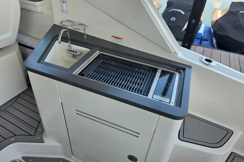 Slide: The Image of Outdoor kitchenette on 2021 Sea Ray Sundancer 350 yacht with sink and grill. - 22