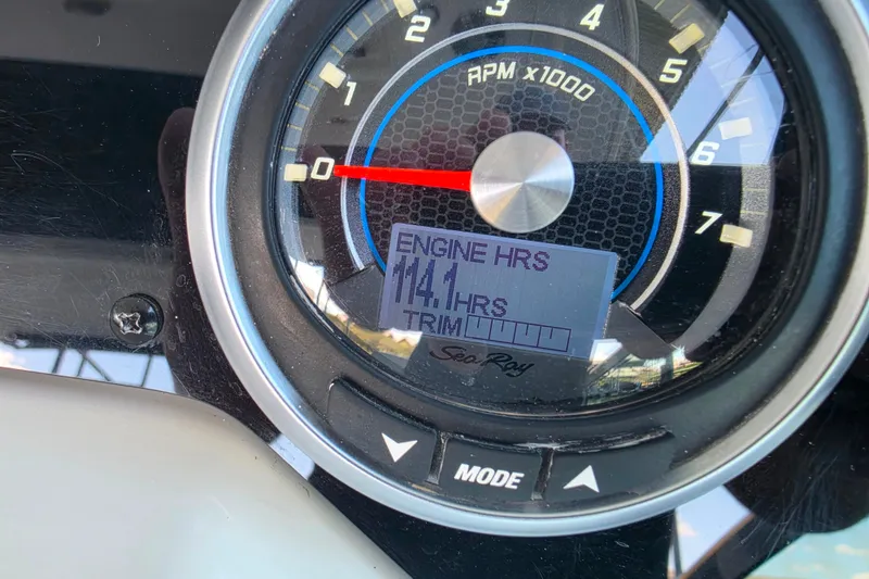 Slide: The Image of Close-up of 2021 Sea Ray Sundancer 350 tachometer displaying 141 engine hours. - 60