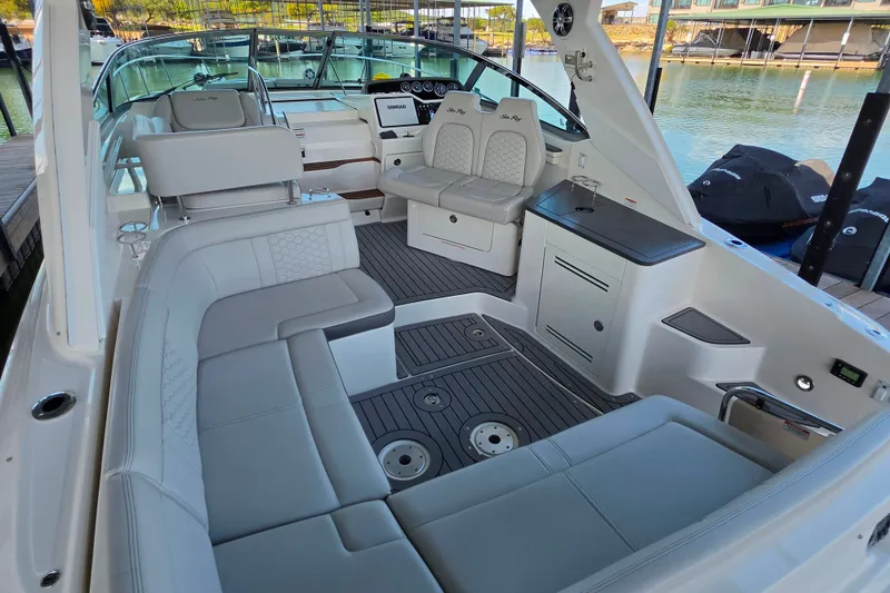 Slide: The Image of Luxurious 2021 Sea Ray Sundancer 350 boat interior with elegant seating and modern amenities. - 38