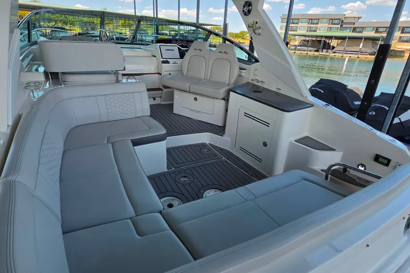 Slide: The Image of Luxurious interior of 2021 Sea Ray Sundancer 350 yacht with elegant seating and modern amenities. - 37