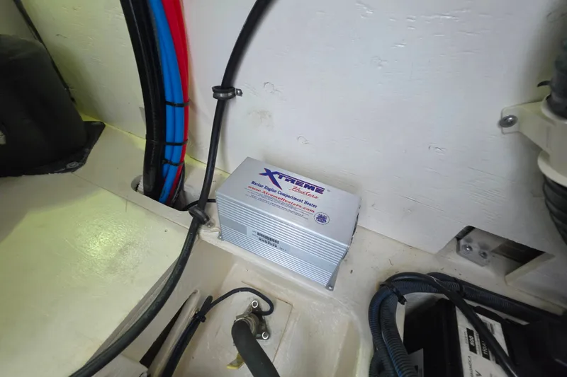 Slide: The Image of Marine engine compartment of 2021 Sea Ray Sundancer 350 with Xtreme heater installed. - 59