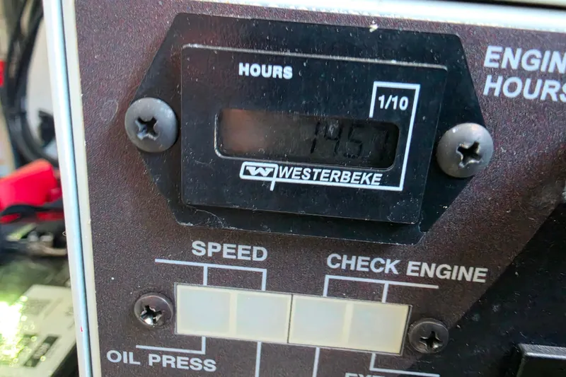 Slide: The Image of Engine hour meter displaying 1457 hours on a 2021 Sea Ray Sundancer 350. - 57
