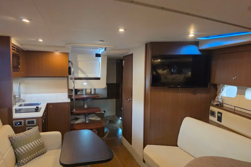 Slide: The Image of Luxurious interior of 2021 Sea Ray Sundancer 350 yacht with modern amenities and elegant design. - 47