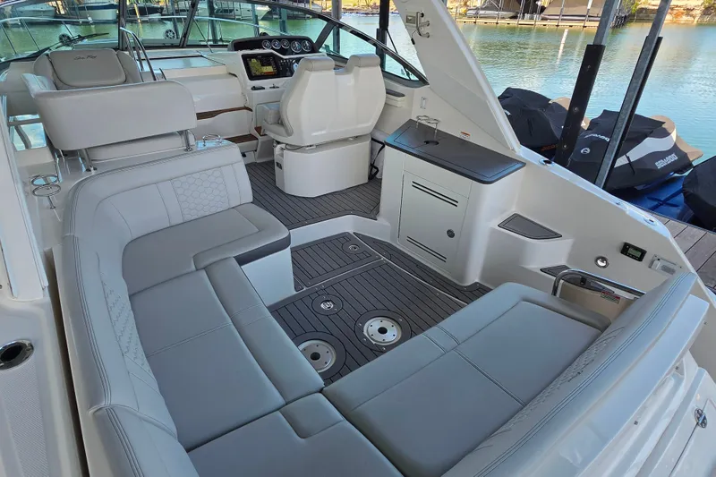 Slide: The Image of Luxurious interior of 2021 Sea Ray Sundancer 350 yacht with plush seating and modern helm. - 17
