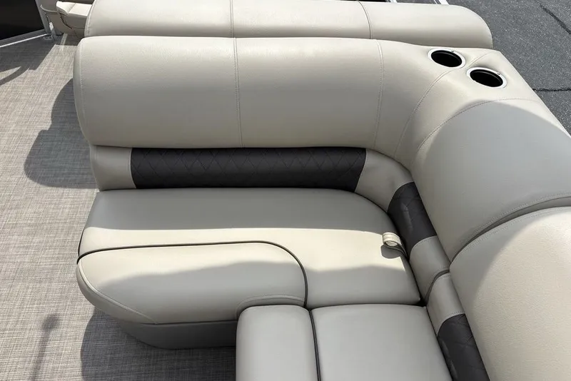 Slide: The Image of Luxurious seating on 2027 Sun Tracker Fishin' Barge 22 XP3 with cup holders. - 23