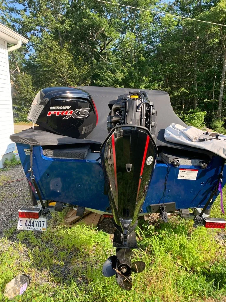 Slide: The Image of A blue 2024 Lund 1775 Adventure Sport with a Mercury Pro XS outboard motor. - 8