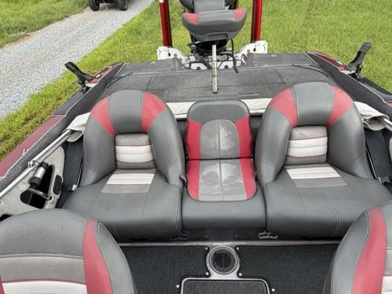 Slide: The Image of The image shows the seats of a 2012 Ranger 212LS Reata boat with gray and red upholstery. - 15
