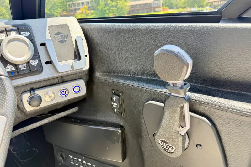 Slide: The Image of Control panel of a 2020 Malibu Wakesetter 24 MXZ boat interior. - 22