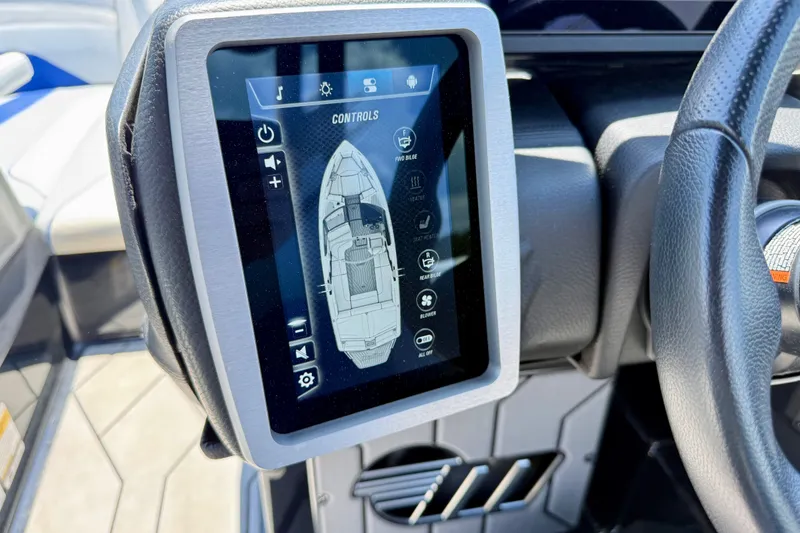 Slide: The Image of Touchscreen control panel in 2020 Malibu Wakesetter 24 MXZ boat cockpit. - 20
