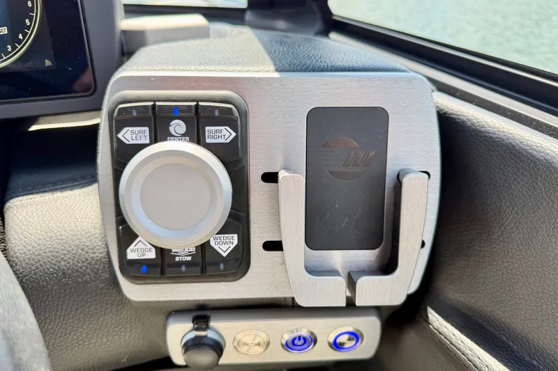 Slide: The Image of Control panel of 2020 Malibu Wakesetter 24 MXZ boat with surf and wedge settings. - 23